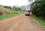 A road scheduled for development as a main artery of the Nacala Corridor. The road is currently unpaved.