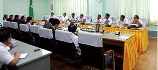 An active discussion at a meeting with leading local figures